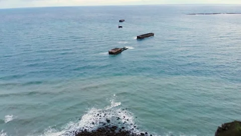 Arromanches les Bains D-Day landing site Cap Manvieux cliffs and Gold Beach.. Stock Footage 341883422