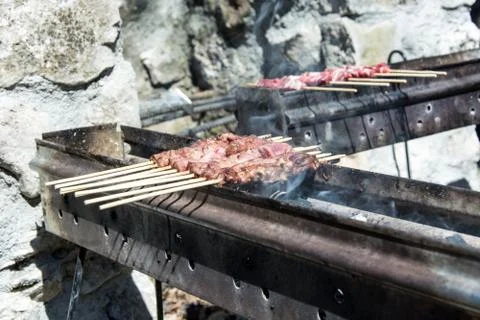 Arrosticini on the grill Foto stock