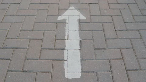Arrow on the asphalt footpath surface symbol concept direction 스톡 동영상 140404008