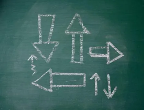 Arrow on chalk board 库存照片