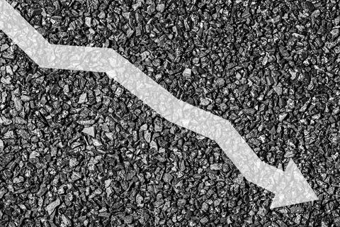 Arrow down on coal background. The concept of falling prices, mining, impor.. 写真素材