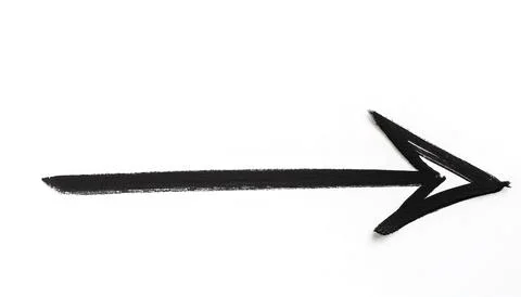 Arrow drawn with black magic marker on white paper background, Realistic ro.. Stock Photos