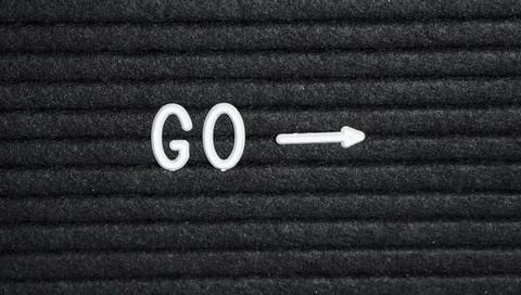 Arrow with go textile Stock Photos