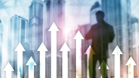 Up arrow graph on skyscraper background. Invesment and financial growth conce Photos