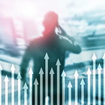 Up arrow graph on skyscraper background. Invesment and financial growth conce Stock Photos