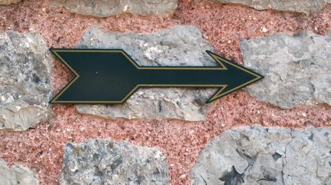 Arrow mark on the wall 스톡 사진