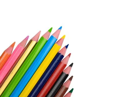 Arrow pattern made with some different wood pencil crayons on white backgroun Stock Photos