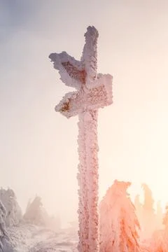Arrow pointer. Winter snow-capped mountains. Place for text Stock Photos