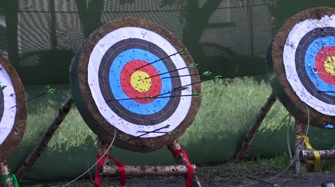 The arrow released from the bow hits the target. Stock Footage