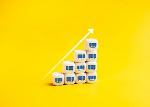 Arrow rising on white cube blocks as growth graph steps with data center ic.. Stock Photos