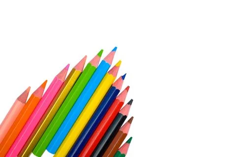 An arrow shaped made with some different colored wood pencil crayons on a whi Stock Photos
