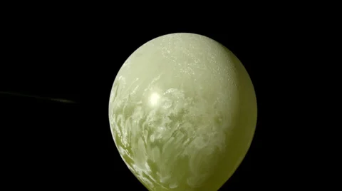 Arrow shooting through a dust covered balloon Stock Footage 36930237
