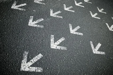 Arrows on asphalt Фото