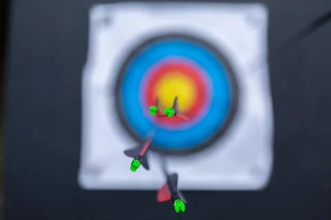 Arrows with a blurd target on the background Stock Photos
