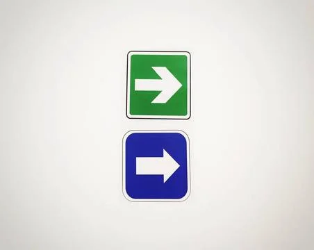  Arrows Exit sign Sign-pointer in the form of an arrow, attached to the wa... Stock Photos