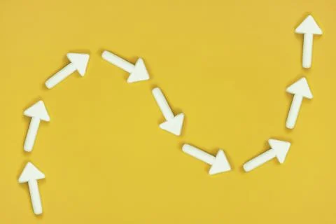 Arrows pointing the way of up and down, self development chart. Sin wave char Stock Photos