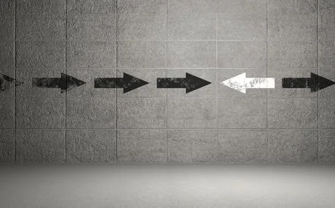 Arrows symbol on checked pattern wall Foto stock