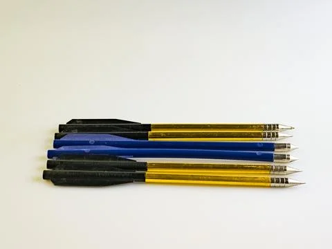 Arrows for a training crossbow on a white background. Set of six. Blue and .. Stock Photos