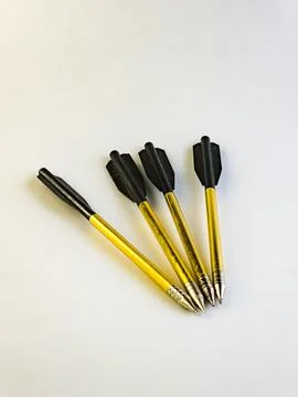 Arrows for a training crossbow on a white background. Set of four. Placed w.. Stock Photos