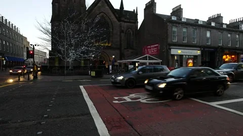 Ars wait for a traffic light at the Union street in Aberdeen Stock Footage 58014378