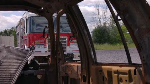 Arson on a car scene with fire truck Stock Footage 330892425