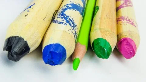 Art and drawing creative concepts of colorful crayon pencils with triangle sh Stock Photos