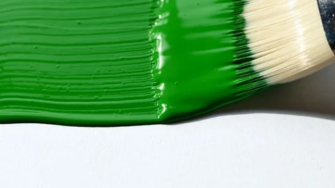 Art brush. Colored background. Brush to paint the canvas. To paint in green Stock Footage 105464944
