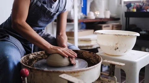 Art clay, Closeup Hands work on ceramic wheel at pottery workshop Small business Stock Footage 285091306