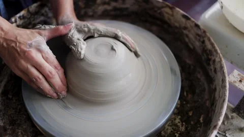 Art clay, Hands work with ceramic wheel at pottery workshop. Small business Stock Footage 293633923