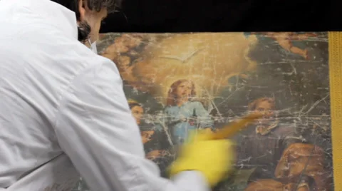 Art conservation, Cleaning a Painting Stock Footage 33813053