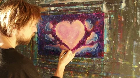 Art creative process. Artist create heart. painting on canvas Stock Footage 87494697