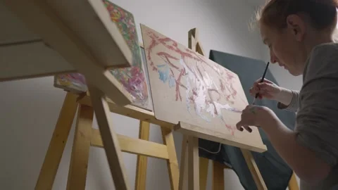 Art is a creative process that requires the artist to focus and attention in Stock Footage 240848516