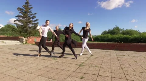 The art of dance. Group of four young people dancing in the street. 4K Stock-Footage 66370362