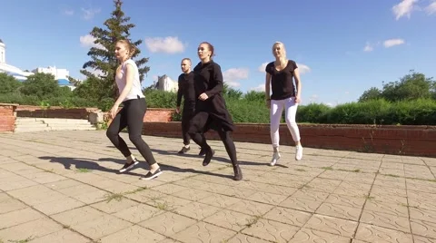 The art of dance. Group of four young people dancing in the street. 4K Stock Footage 66370647