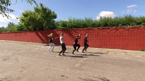 The art of dance. Group of four young people dancing in the street. 4K Stock-Footage 66371367