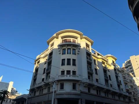 Art deco building facade under blue sky in Casablanca Morocco Stock Photos