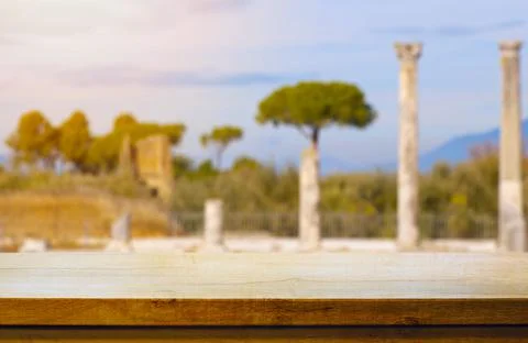 Art Empty wooden deck table on countryside antique italian landscape backgrou Stock Photos