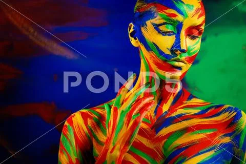 Art fashion makeup and body paint. Color face of woman for inspiration. Abstract Stock Photos