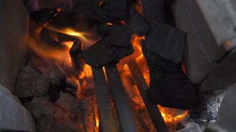 Art in the Forge Fire and Coal in the Artisanal Metal Foundry Stock Footage 293180803