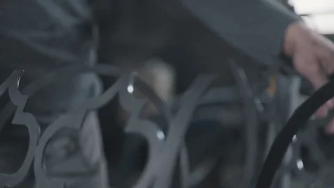 Art forging - process of creating product made of metal with ornament Stock Footage 74694528