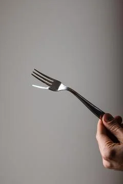 Art of Fork Bending, How to Bend Forks with Your Mind Stock Photos