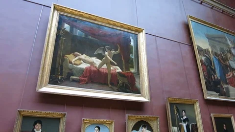 Art frames on a red wall of the Louvre Museum, in Paris, France. Stock Footage 117214179