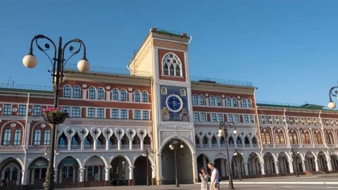 Art Gallery with people walking in city square. Drone footage. Stock Footage
