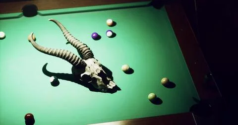 Art installation on a pool table with a ram skull and colorful balls Stock Illustration