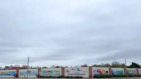 Art on a large long wall on Wrightsboro Road in Augusta Georgia by The Greate Stock Footage 147096553