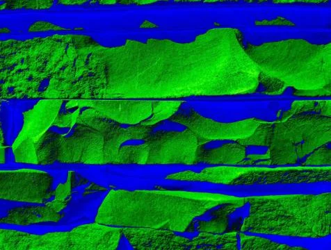 Art - an object of a building wall made of green and blue stones Illustrazione stock