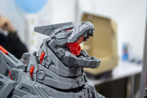 Art object. Object printed on 3D printer. Robot toy created on 3D printer. Stock Photos