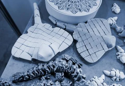 Art objects printed 3D printer. Various creative models created on a 3D printer Stock Photos
