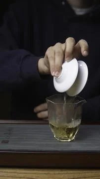 The Art of Preparing Tea Using Beautiful Elegant Ceramics and Exquisite 写真素材