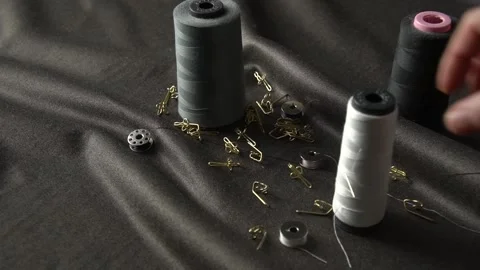 The art of Sewing Threads and Accessories used on the Fabric Surface to enhance Stock Footage 310248393
